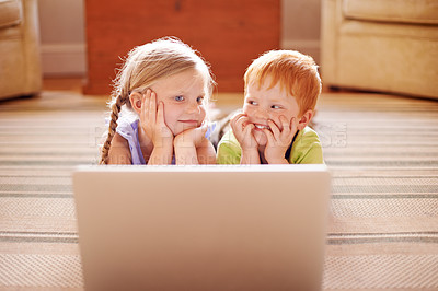 Buy stock photo Knowledge, siblings and children with laptop, floor and watching of educational videos, home and relax. House, sister and brother with information in living room, growth and development for youth