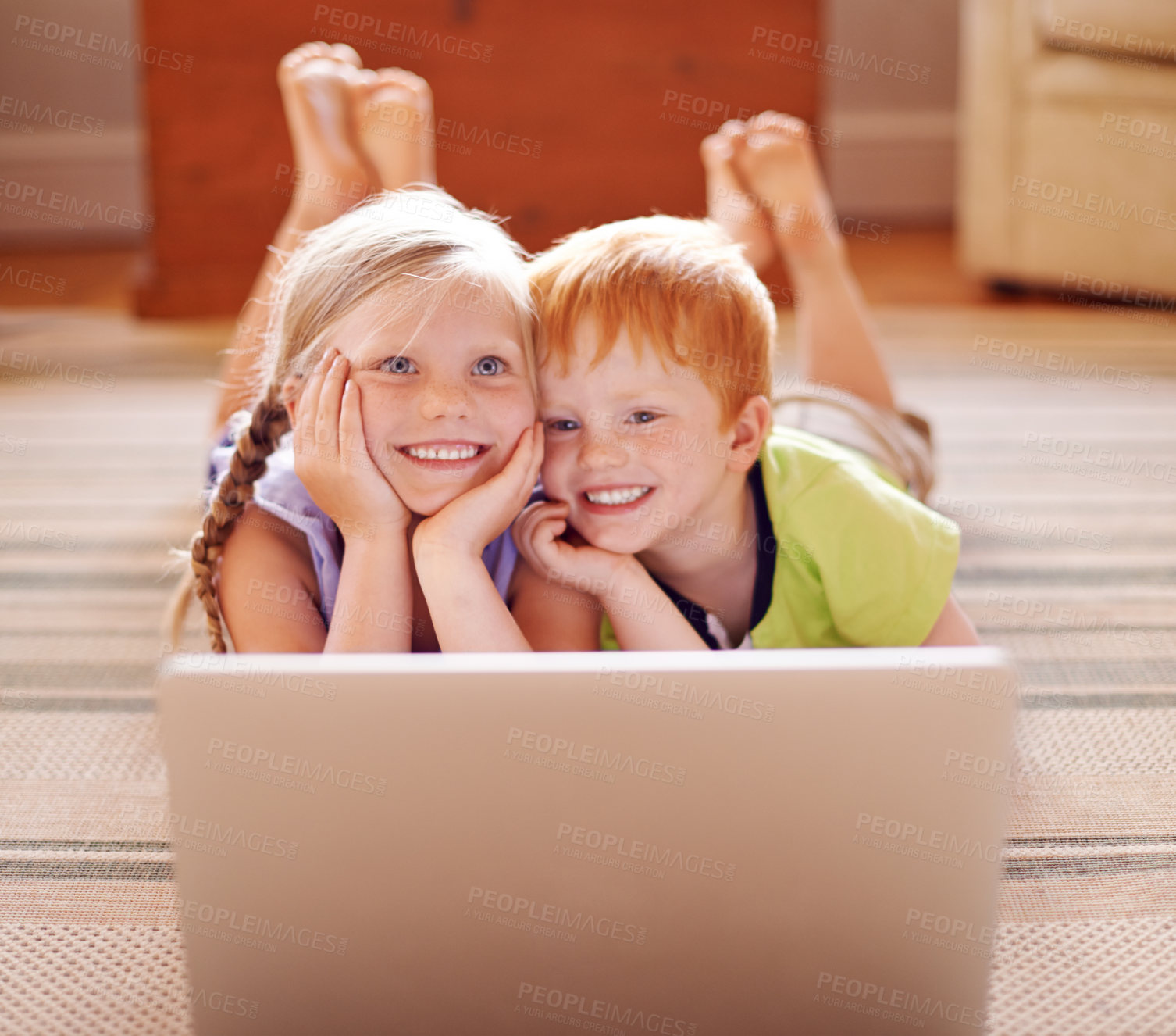 Buy stock photo Watching, siblings and children with laptop, floor and education with videos, learning and thinking. House, sister and brother with knowledge in living room, growth or development for youth with info