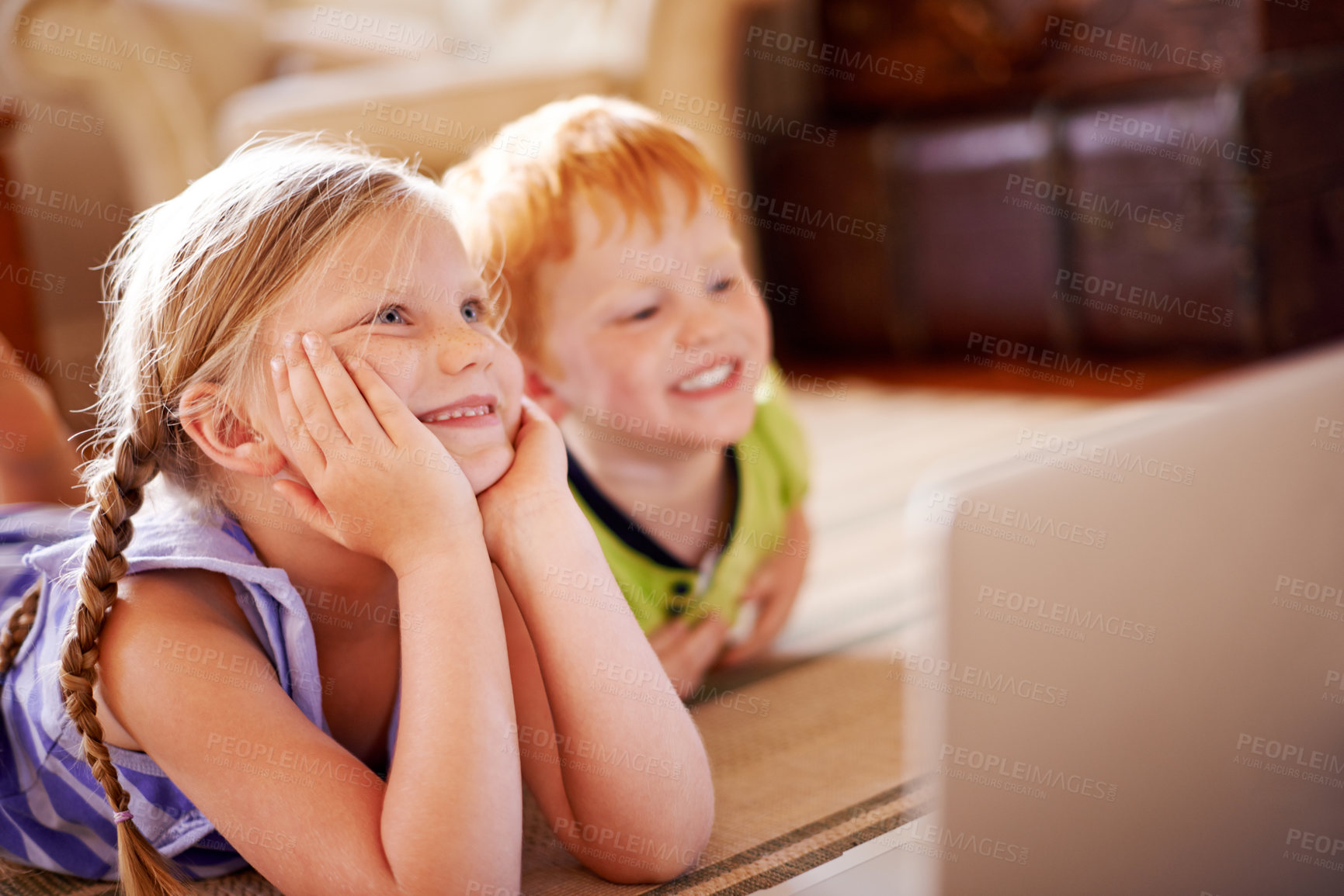 Buy stock photo Relax, siblings and children with laptop, floor and education with videos, learning and watching. House, sister and brother with knowledge in living room, growth or development for youth with info