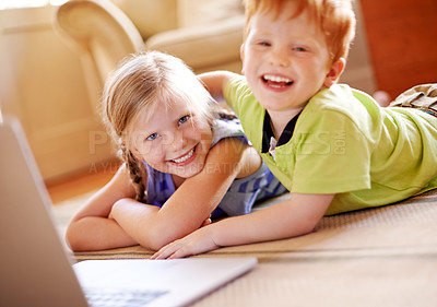 Buy stock photo Portrait, children and hug for love at house of affection, playful comfort and bonding together. Smile, kids and rest on laptop of streaming movies, education website and family relationship on floor