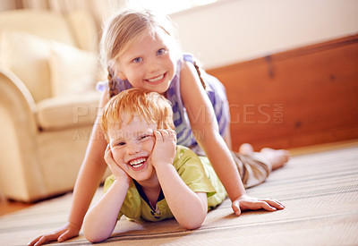 Buy stock photo Happy, girl and boy portrait with siblings in home for bonding, love and playing together for fun. Games, childhood and family on living room floor, playful children with brother and sister in house