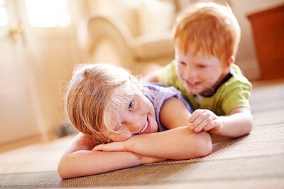 Buy stock photo Family, portrait and smile of children on floor of living room in home for bonding or playing. Development, growth or happy with boy and girl kids on carpet in apartment for fun or games as siblings