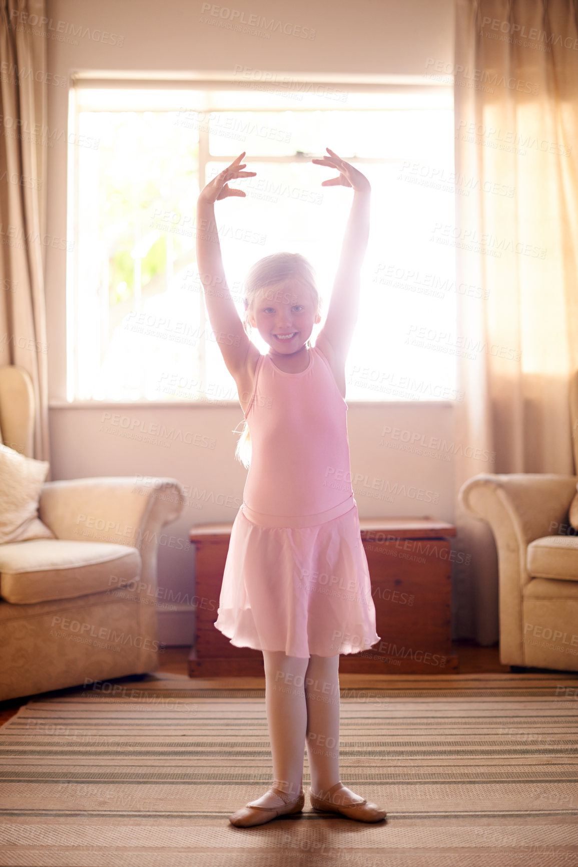 Buy stock photo Girl, portrait and tutu for ballet practice, confidence and skill in living room for growth or fun in home. Child, artist and smile with dancer, happiness or development for creative in house lounge