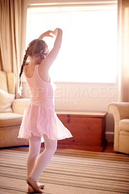 Buy stock photo House, ballet and girl with energy, dancing and growth with pink tutu, learning and practice. Apartment, ballerina or kid with costume, training for performance or creativity with movement or routine