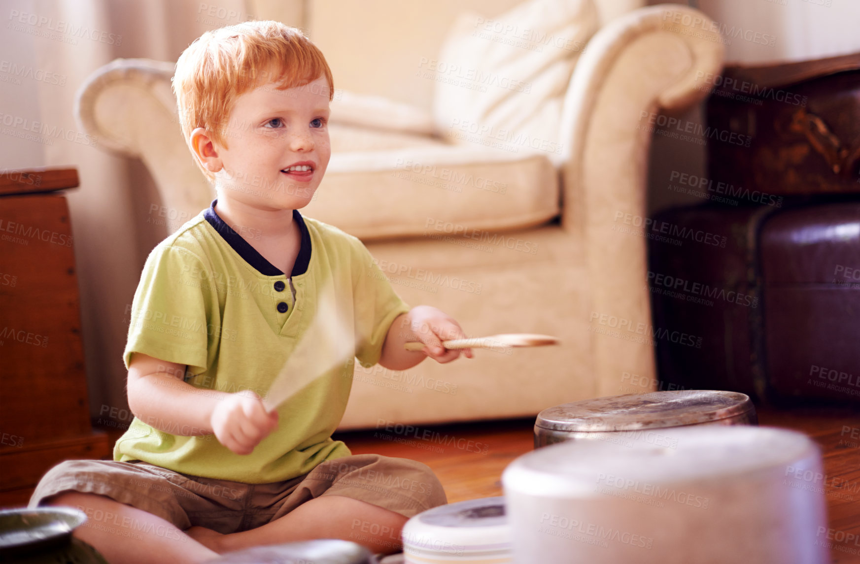 Buy stock photo Drums, pans and pots with boy on living room floor of home to imagine fantasy band or concert. Instrument, music or playing and happy child with wooden spoons for beating or rhythm in apartment
