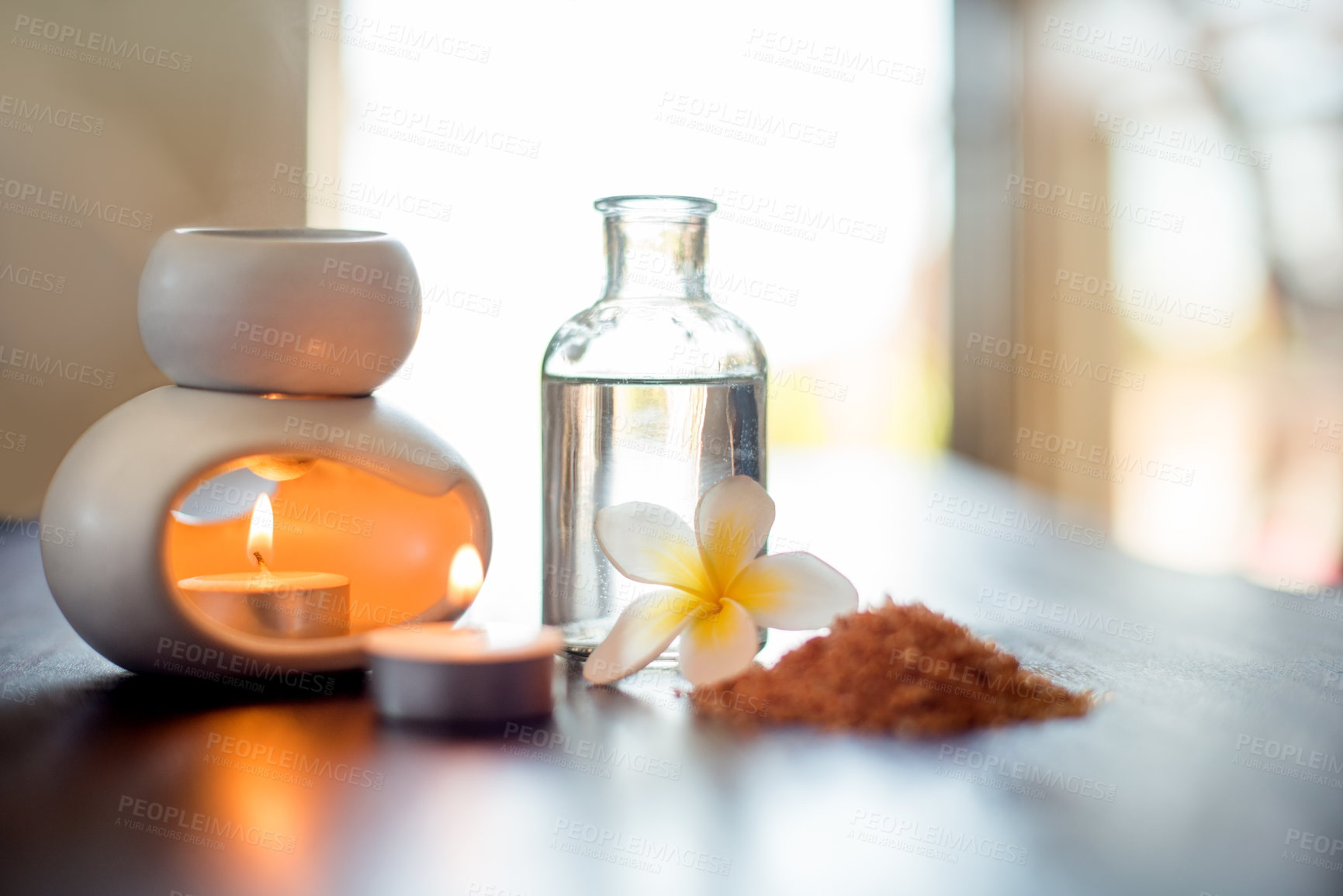 Buy stock photo Flower, incense and aromatherapy product on table with candles, peace and natural fragrance. Holistic health, hospitality service and powder with essential oil for self care at luxury wellness spa
