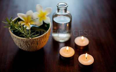 Buy stock photo Flower, candles and rosemary in spa for beauty, wellness and skincare treatment with herbs. Salon aesthetic, dermatology and essential oil for cosmetics, aromatherapy and health for calm or peace