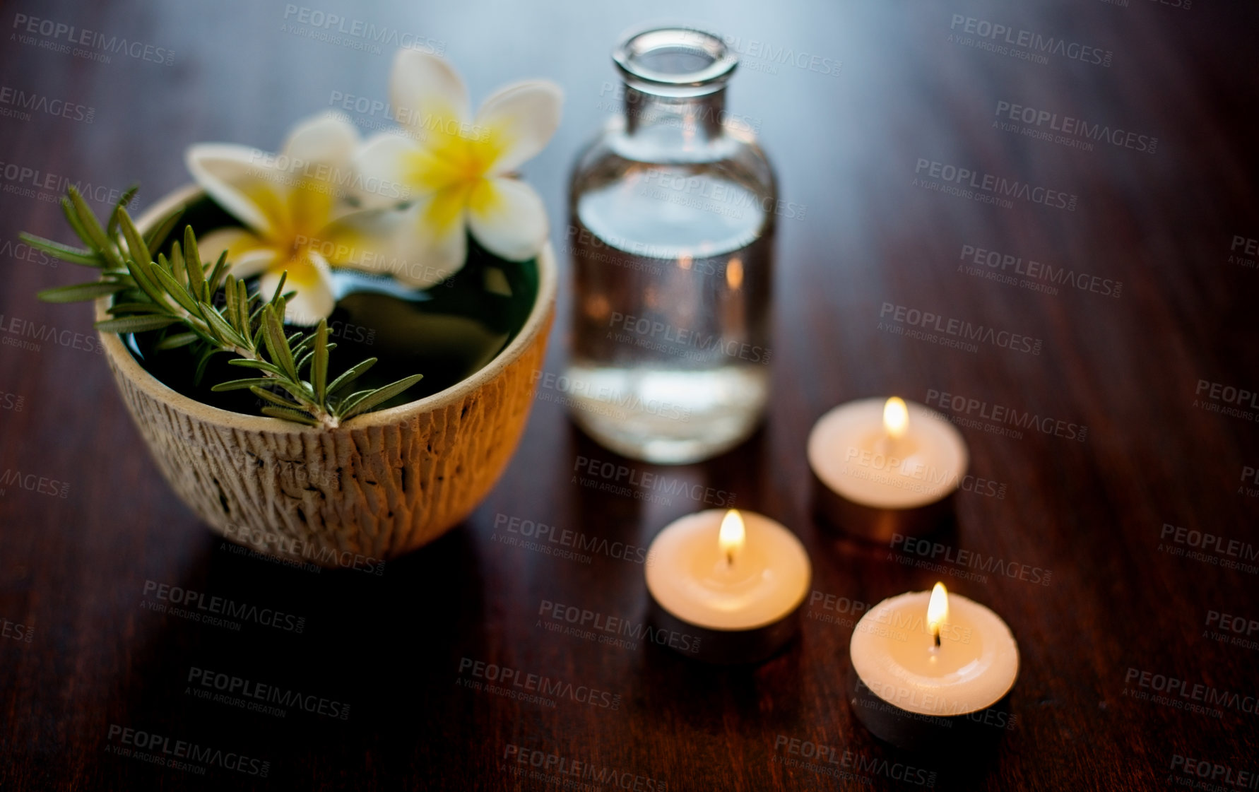 Buy stock photo Flower, candles and rosemary in spa for beauty, wellness and skincare treatment with herbs. Salon aesthetic, dermatology and essential oil for cosmetics, aromatherapy and health for calm or peace