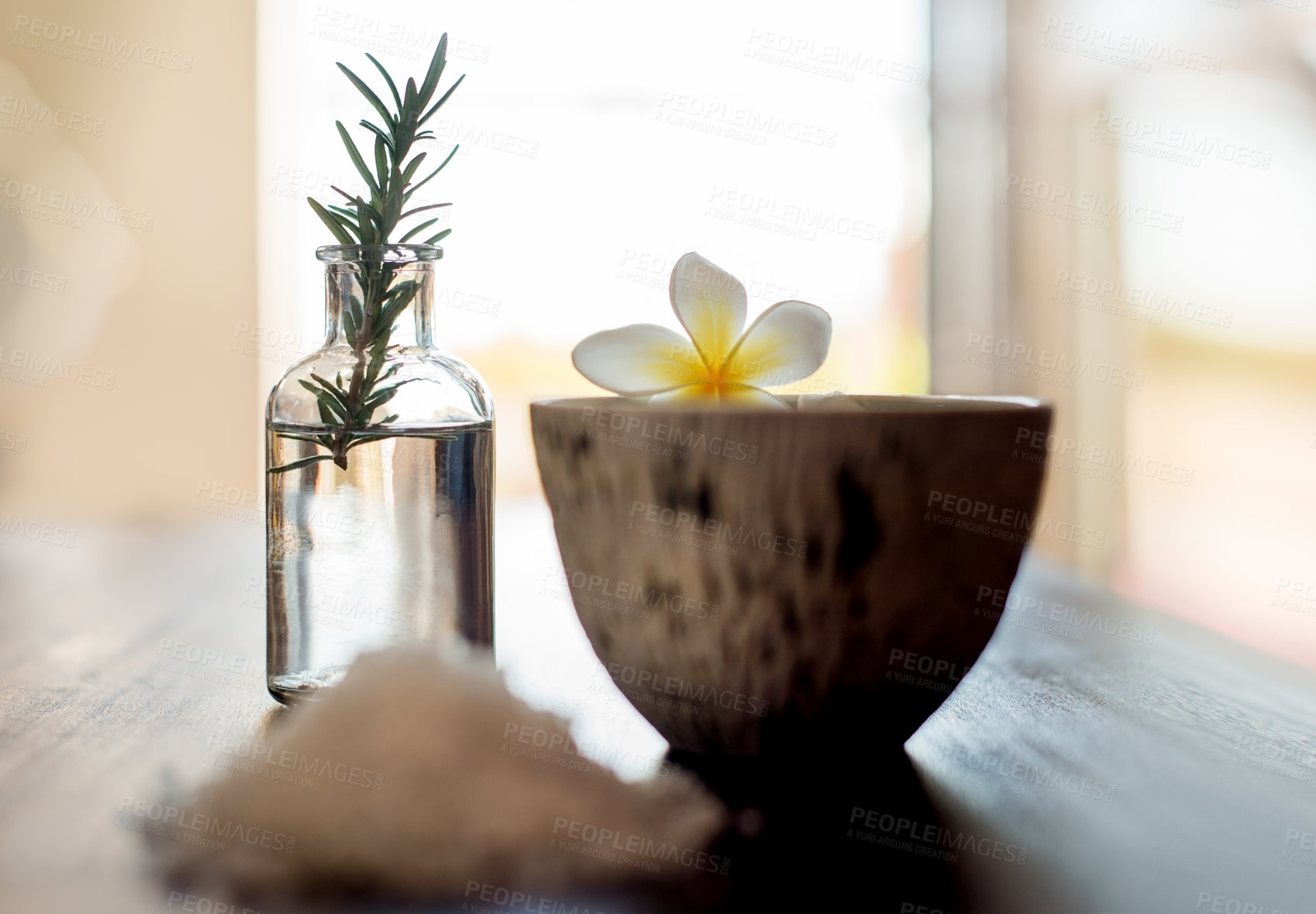 Buy stock photo Flowers, rosemary and aesthetic in spa for beauty, wellness and self care treatment. Luxury salon, holistic and salt with herbs for cosmetics, aromatherapy and health detox for zen, calm and peace