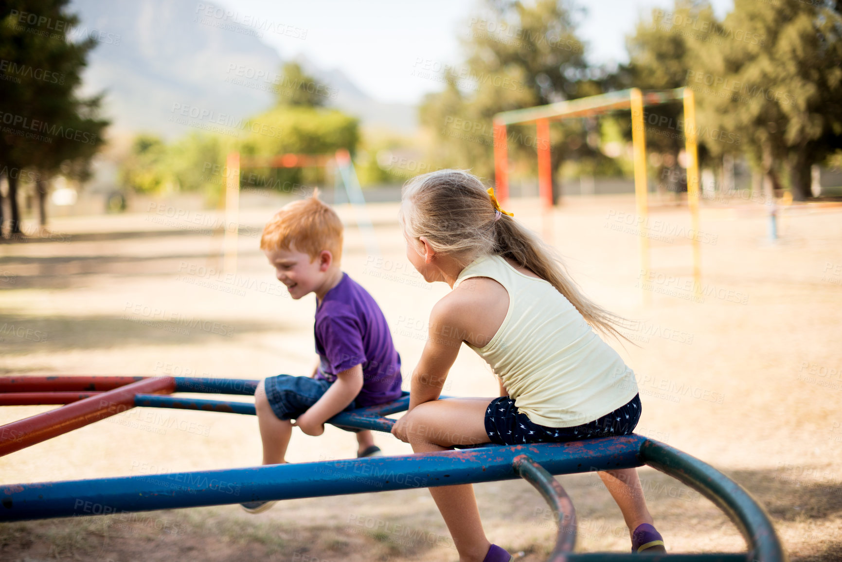 Buy stock photo Fun, playground and back with kids in park for growth, adventure and merry go round game. Cute, happiness and kindergarten children playing outdoors for exercise, balance and smile on summer holiday