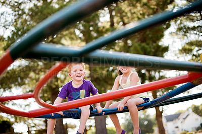 Buy stock photo Happy children, spin and playground with fun childhood on merry go round or carousel at outdoor park. Youth, young kids or little siblings with smile for playful summer, holiday or weekend together