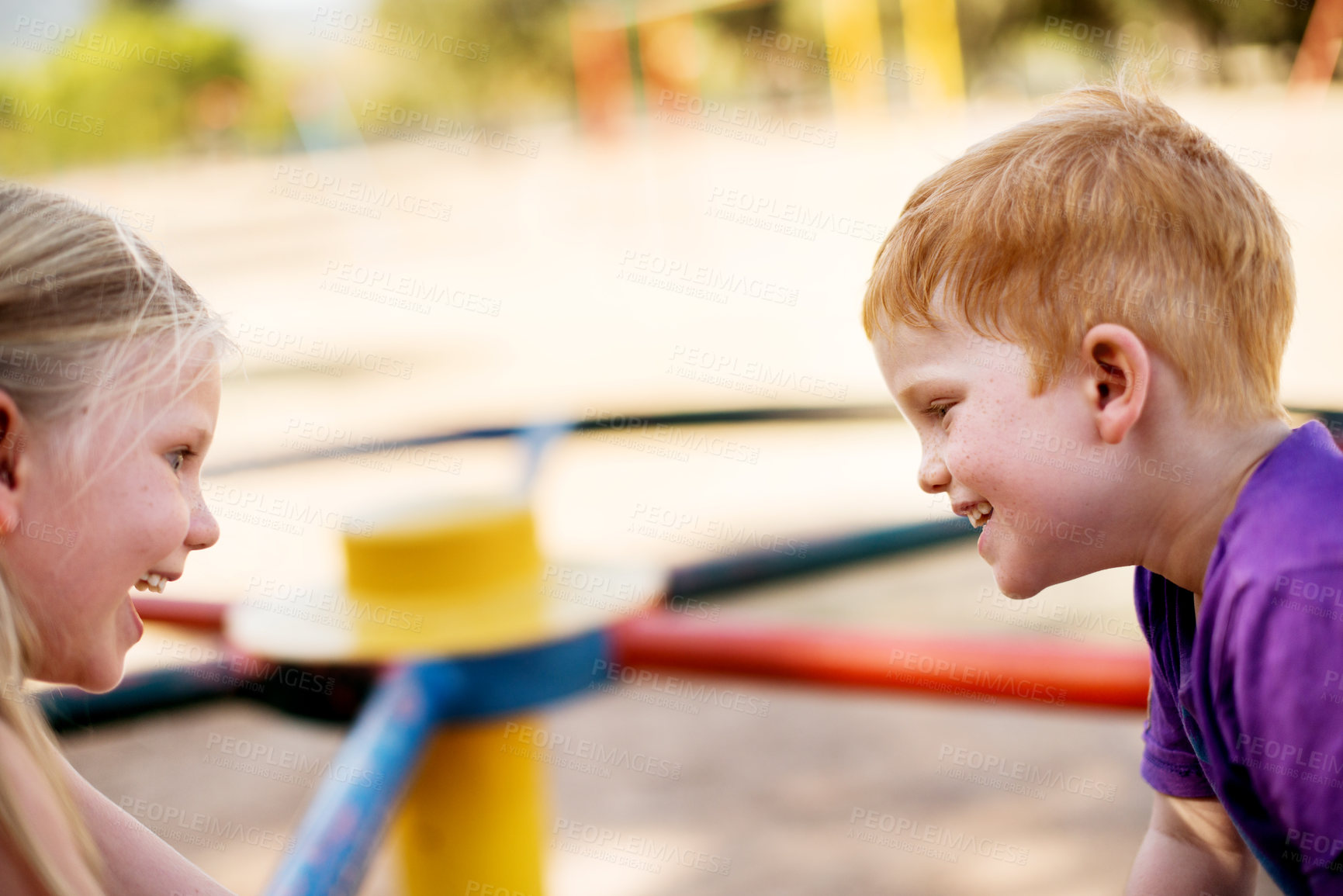 Buy stock photo Happy kids, spin and playground with fun childhood on merry go round or carousel at outdoor play park. Youth, young or little friends with smile for playful summer, holiday or weekend together