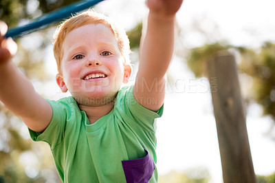 Buy stock photo Happy, child and outdoor playground with equipment, adventure and playful exercise portrait. Smile, boy and fun games with motor growth, summer holiday and jungle gym support for childhood activity