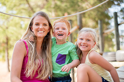 Buy stock photo Mother, children and outdoor portrait for hug, explore nature and playground for laughing together. Mommy, kids and support with family bonding for happiness, park embrace and fantasy adventure games