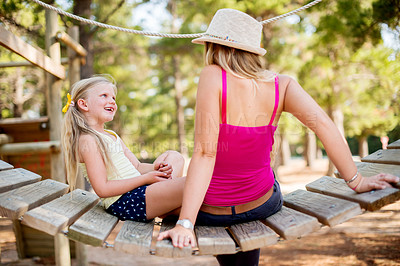 Buy stock photo Family, mother and girl in park, fun and conversation with break, hobby and bonding together. Mama, outdoor and parent with daughter, relax and activity in playground, discussion and happiness