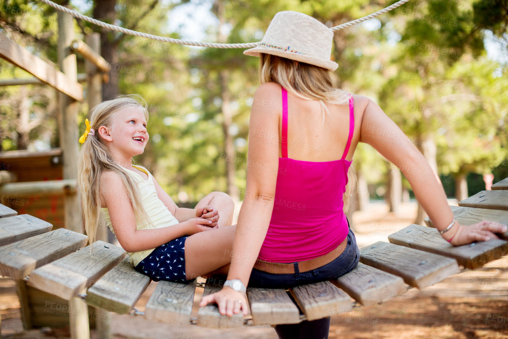 Buy stock photo Family, mother and girl in park, fun and conversation with break, hobby and bonding together. Mama, outdoor and parent with daughter, relax and activity in playground, discussion and happiness