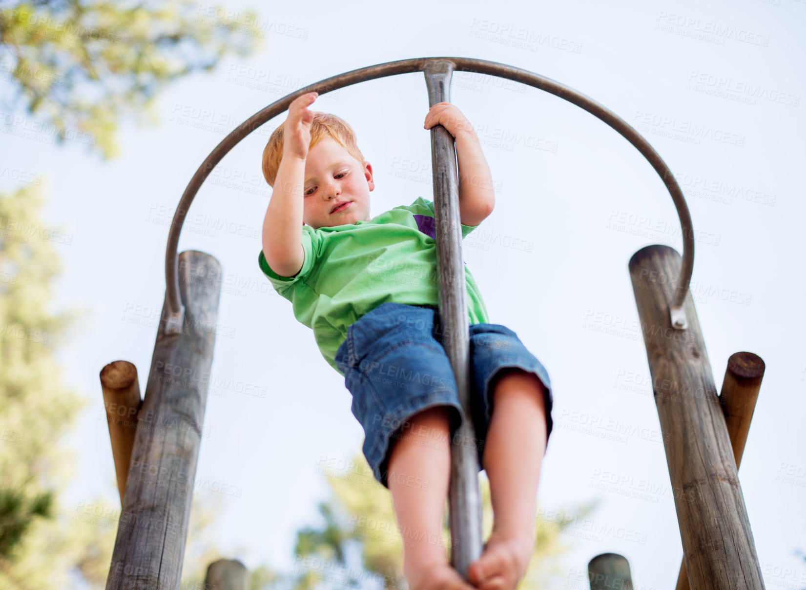 Buy stock photo Climbing, playground and youth with boy in park for growth, adventure and pole games. Low angle, happiness and kindergarten child playing outdoors for exercise, balance and  fun on summer holiday