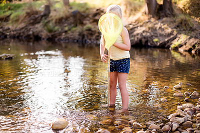 Buy stock photo Kid, river and girl play with fishing net on vacation, holiday and adventure in countryside. Hobby, catch and child in water with equipment for learning, explore and travel by lake in nature outdoor