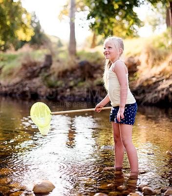 Buy stock photo Happy kid, river and play with fishing net on vacation, holiday or adventure in countryside. Hobby, catch and girl in water with equipment for learning, thinking or hiking to travel in nature outdoor