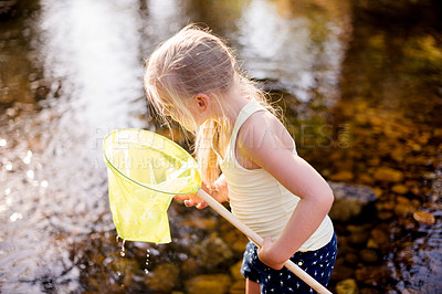 Buy stock photo Kid, water and play with fishing net on vacation, holiday and adventure in countryside. Hobby, catch and girl child in river with equipment for learning, explore or hiking to travel in nature outdoor