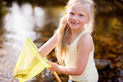 Buy stock photo Kid, portrait and play with fishing net on vacation, holiday and adventure in countryside. Face, catch and happy girl in river with equipment for learning, hobby or hiking to travel in Switzerland