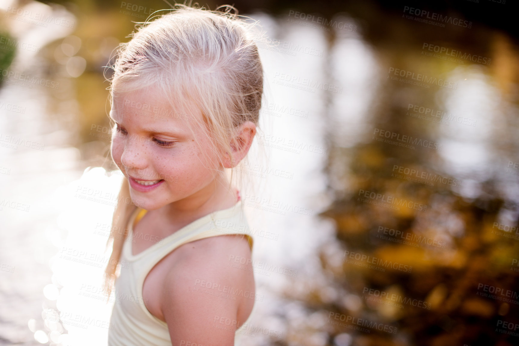 Buy stock photo Holiday, smile and child hiking outdoor for sightseeing, explore nature and travel destination by lake. Happy, girl and water for trekking discovery, young adventure and summer journey on vacation