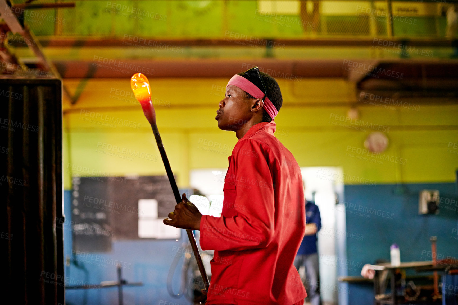 Buy stock photo Glass, craft and black man in workshop for small business with heat, tools or blowing technique. Creative, handmade product or glassblower in factory for sustainable art, design or bottle sculpture