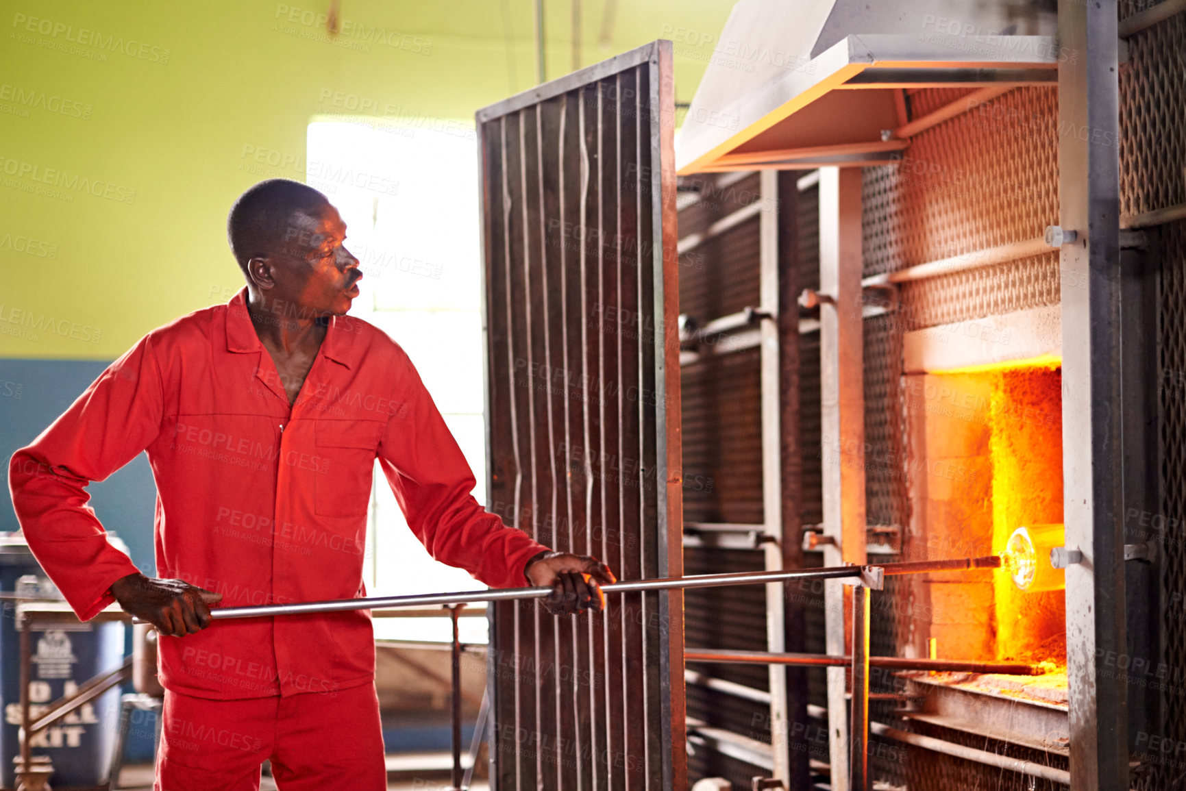 Buy stock photo Furnace, artist and man in workshop with glass for manufacturing windows or products for business. Industry, production and male glassblower with artisan sculpting by fire, heat or flame in factory.