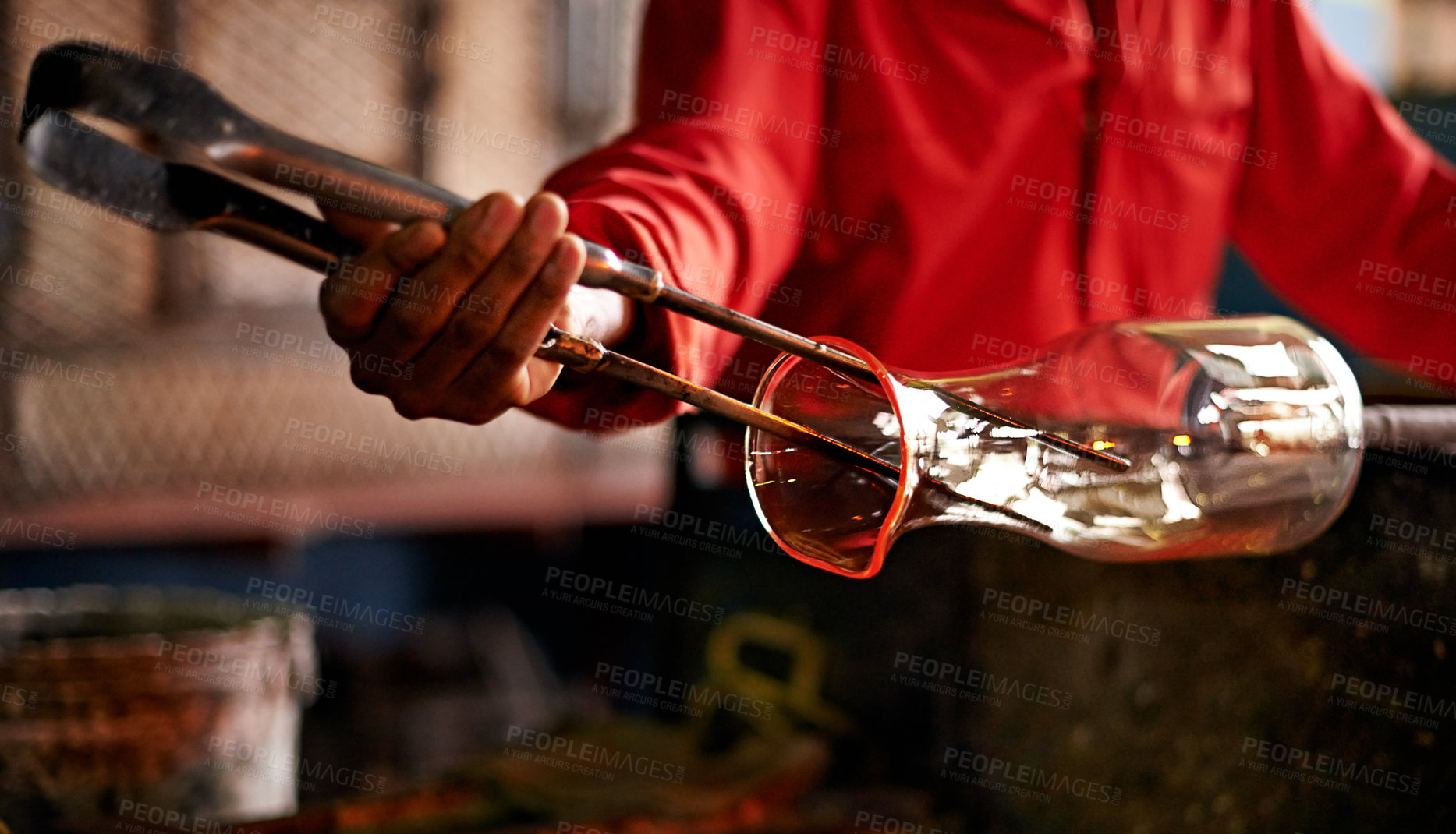 Buy stock photo Hands, person and tools in glass factory for shape, production process and industry. Glassware, craft and worker with equipment for manufacturing art, glassblowing and forming with jacks in workshop