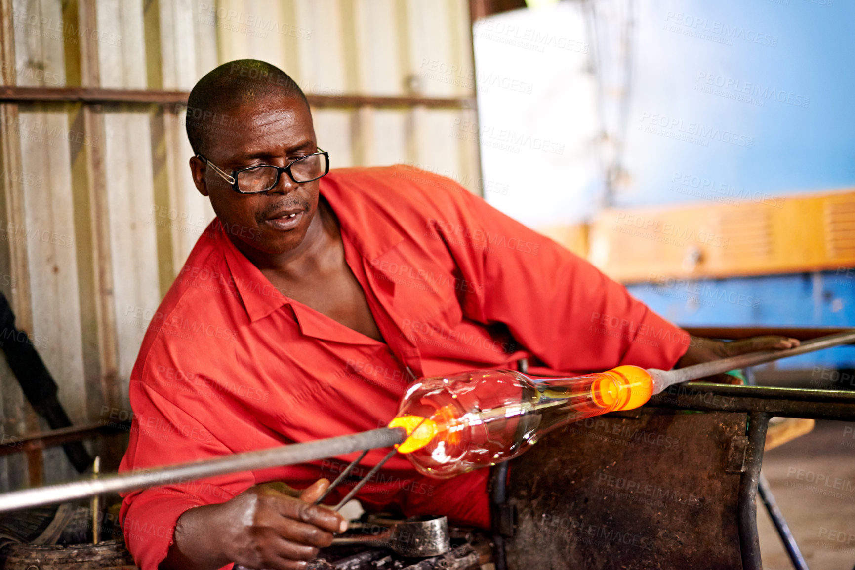 Buy stock photo Glass, art and black man in workshop with shape for small business, tools or handmade technique. Creative, craft product or glassblower in factory for sustainable process, design or bottle sculpture