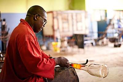 Buy stock photo Glass, blowing and black man in art workshop with small business, craft or handmade technique. Creative, product shape or glassblower in factory for sustainable process, design and sculpture glow