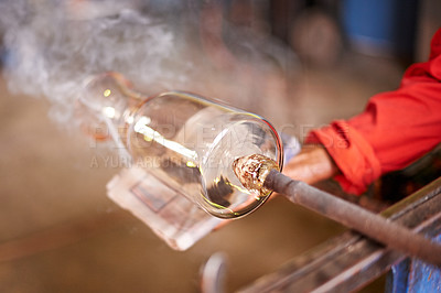 Buy stock photo Cloth, glass and smoke with hands of artisan person in forge or foundry for manufacturing process. Bottle, cleaning and heat with professional glassblower in factory, plant or workshop for production