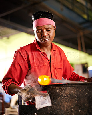 Buy stock photo Glass, blowing and black man in workshop with process, creative small business or handmade form. Art, product shape and glassblower in factory for sustainable craft, design tools and sculpture glow