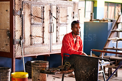Buy stock photo Break, production and thinking with black man artisan in workshop for industrial manufacturing. Idea, planning and vision with professional blacksmith or craftsman in factory for expert metalwork