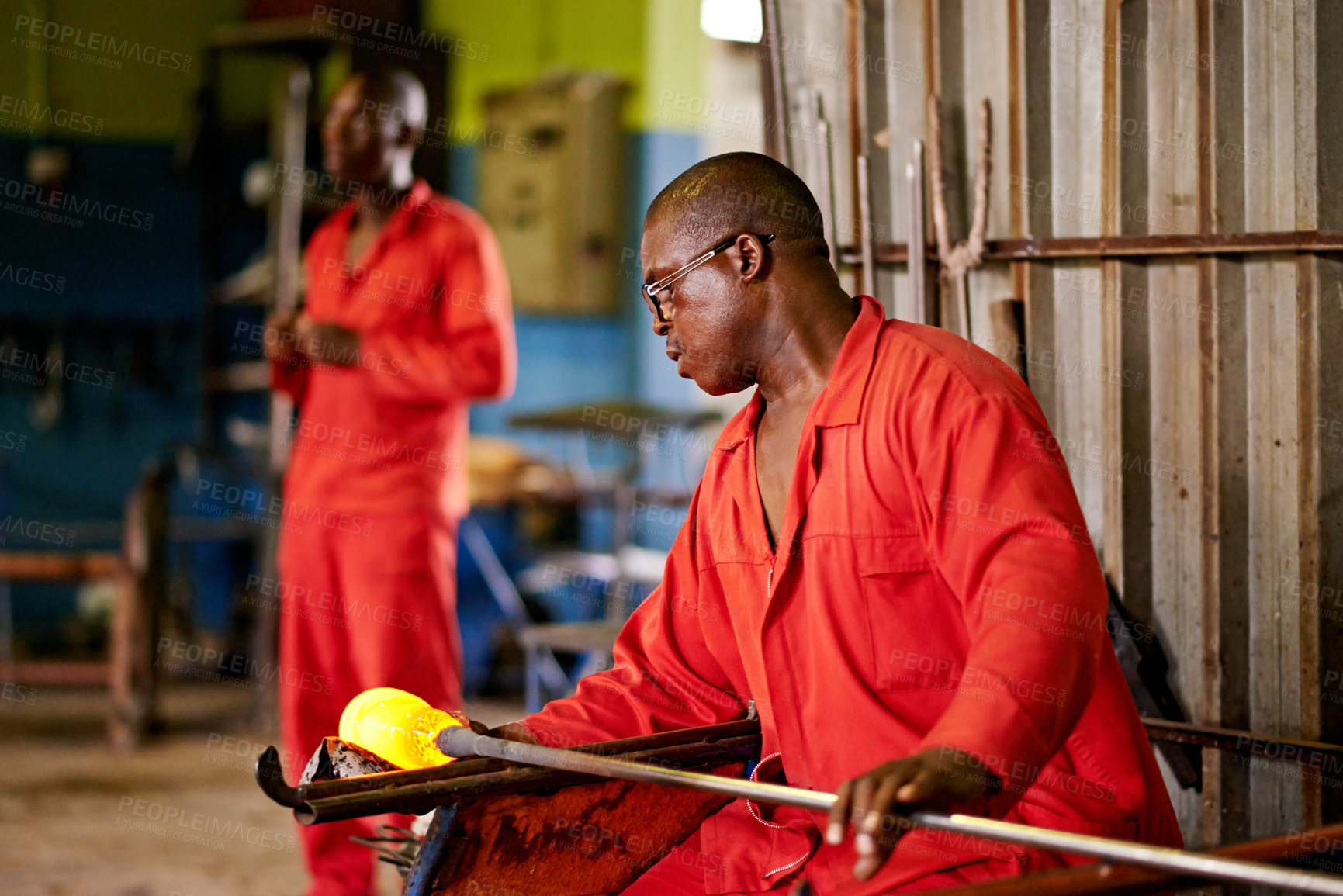 Buy stock photo Glassblowing, working and men with tools, factory and creative for manufacturing of glass and industry. Production, busy and people in uniform for craft, glassmakers and art for design of product
