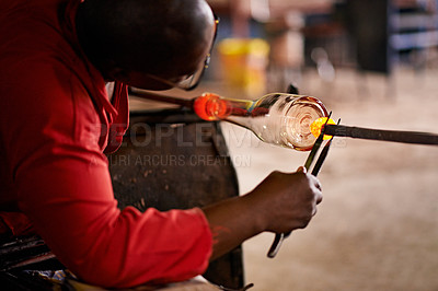 Buy stock photo Design, glassblowing and shape with black man artisan in manufacturing or production workshop. Art, creative and process with professional glassblower in factory, forge or plant for craftsmanship