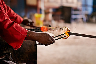 Buy stock photo Hands, tongs and worker in glass factory for industry, manufacturing or production process. Craft. glassware and person with tool for forming or shaping art closeup in forge and foundry workshop