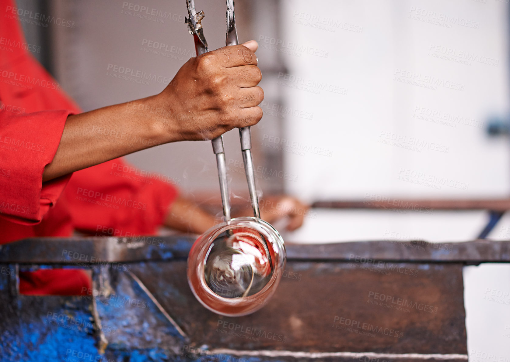 Buy stock photo Artistic, hands and tongs with artisan glassblower in forge or foundry for manufacturing process. Creative, design and shape with professional closeup in factory, plant or workshop for glassblowing