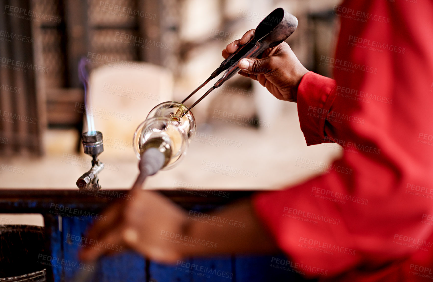 Buy stock photo Glassblowing, hands and tools with artisan person in forge or foundry for manufacturing process. Creative, design and equipment with professional glassblower closeup in factory, plant or workshop