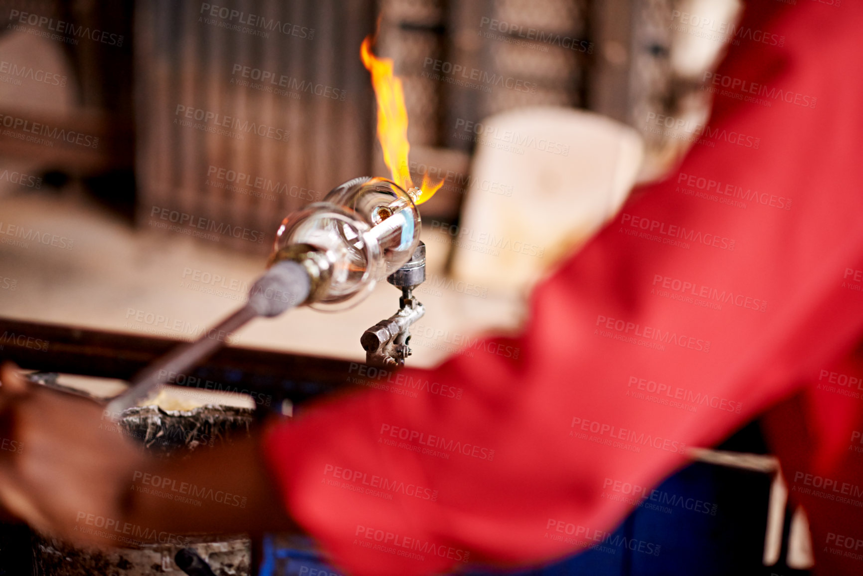 Buy stock photo Fire, glassblowing and hands of artisan person closeup in forge for industry, manufacturing or production. Flame, heat and shape with professional industrial craftsman in factory, plant or workshop