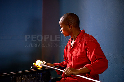 Buy stock photo Glass, studio and black man in workshop for art, small business or artist with handmade shape. Craft, product process and African glassblower in factory for sustainable project, design and heat tools