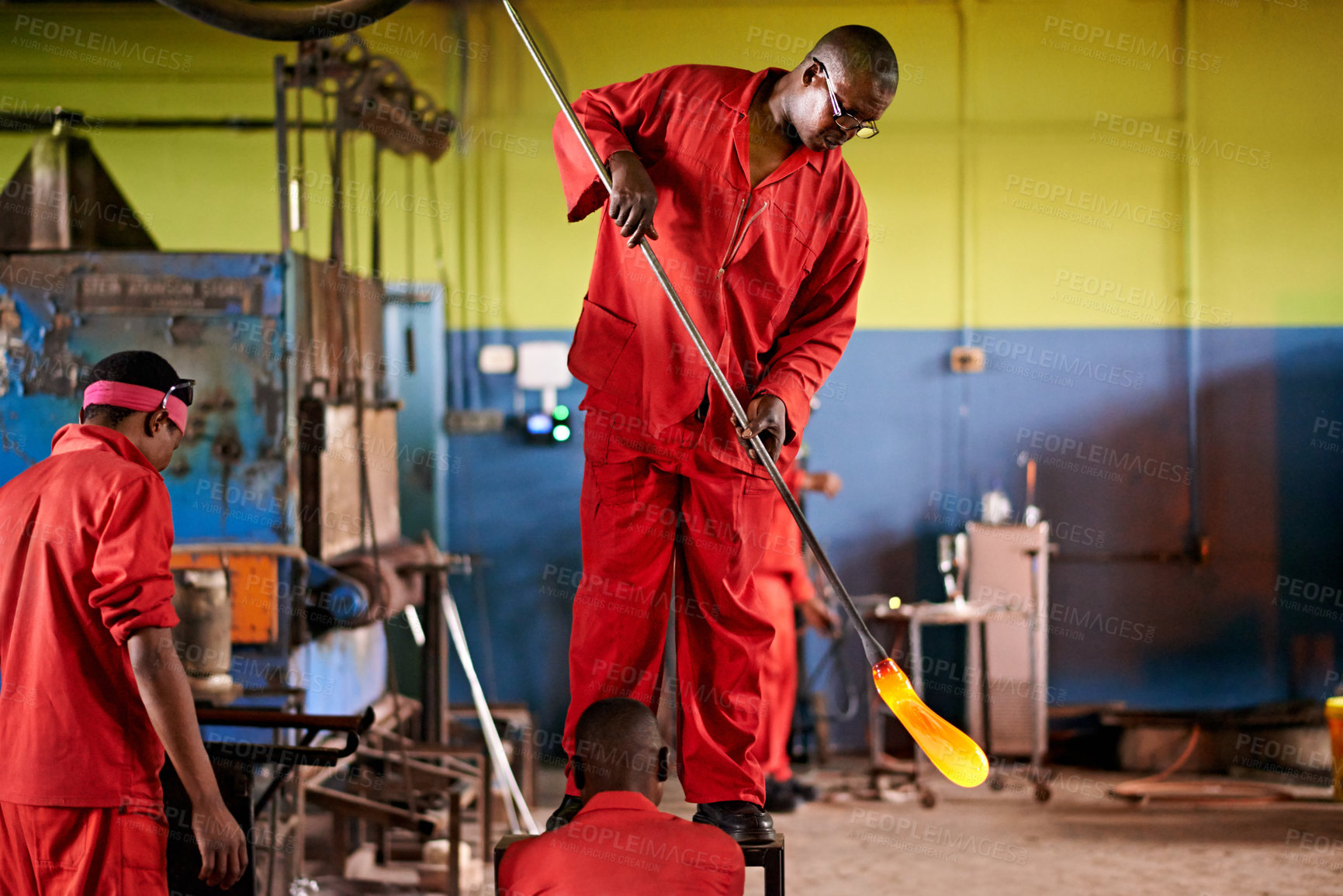 Buy stock photo Glassblowers, glow and people in factory with heating equipment for professional craft production. Labor, workshop or men shaping object with tools for metalwork, manufacturing and forge for molding