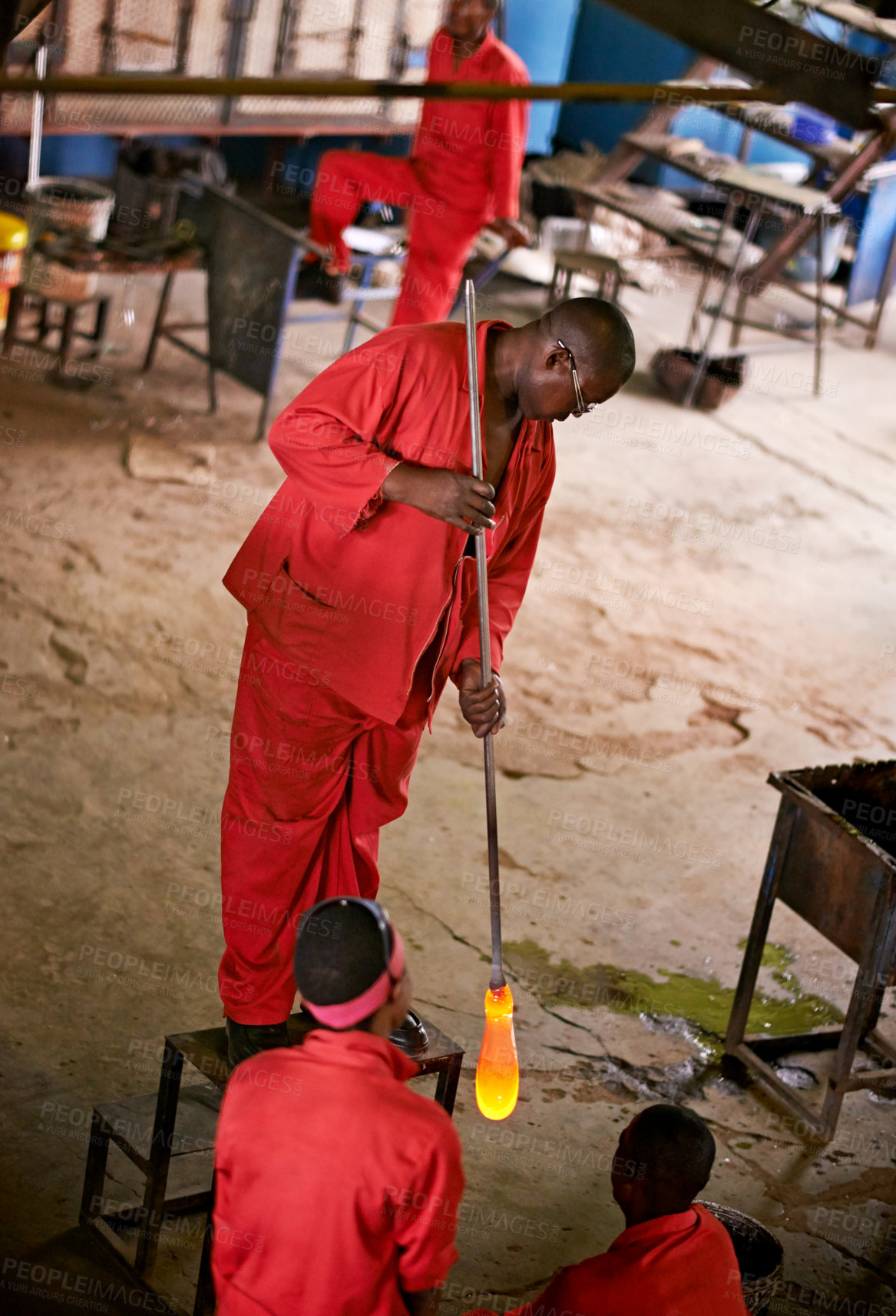 Buy stock photo Glassblowers, glow and men in workshop with heating equipment for professional craft production. Labor, factory or people shaping object with tools for metalwork, manufacturing and forge for molding