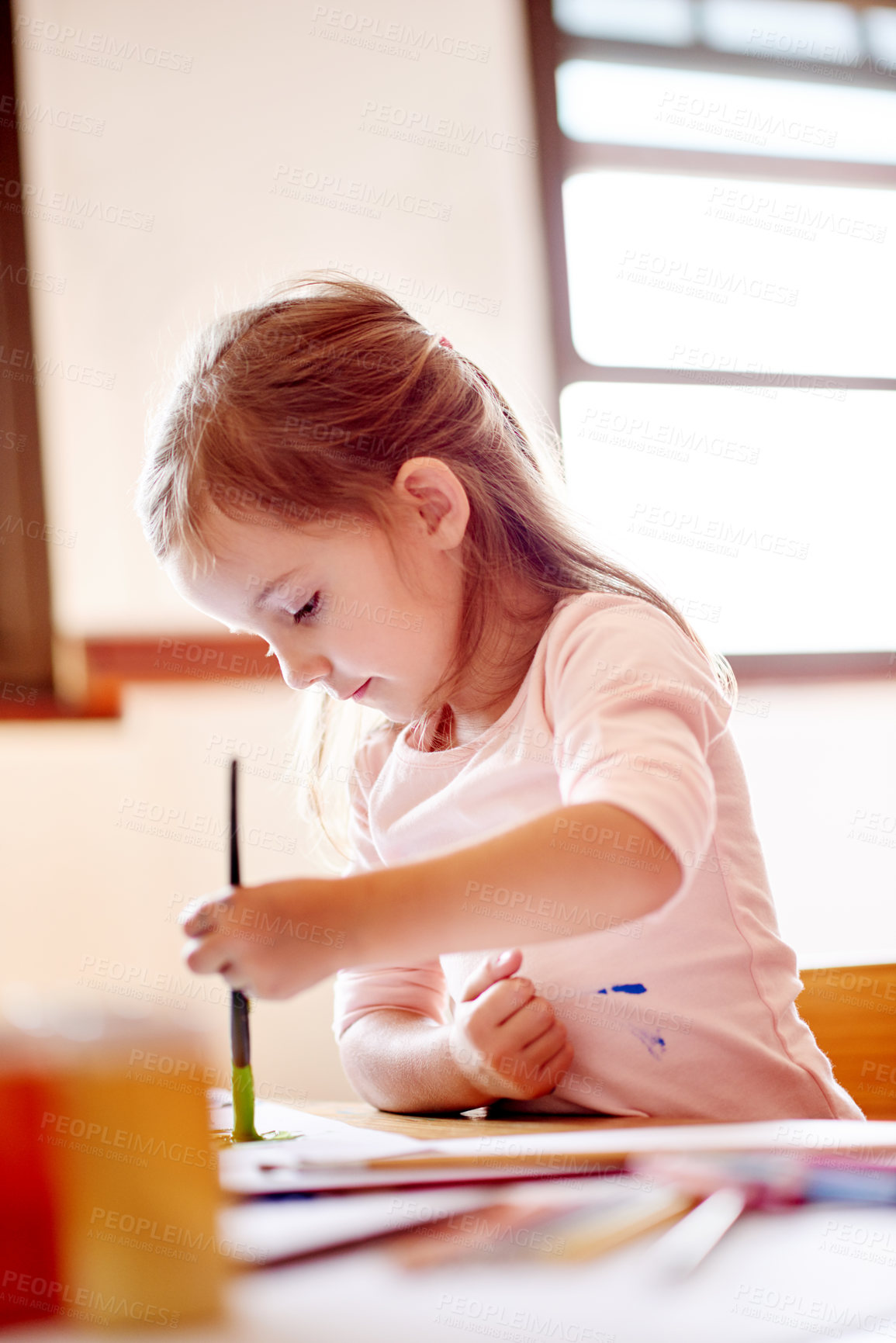 Buy stock photo Creative, painting or child in house with brush for remote learning, hobby or sketching skills. Project, paper or artistic female kid painter with activity for craft education or drawing development