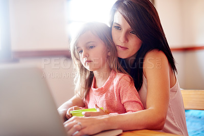 Buy stock photo Elearning, child and mom with laptop, streaming and growth with educational video, online and watching. House, woman and bonding with daughter for knowledge, studying and cognitive development
