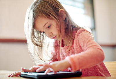 Buy stock photo Kid, student and play with tablet in classroom streaming lesson, elearning website and drawing app. Child, girl and digital for online education, reading ebook and studying application for assessment