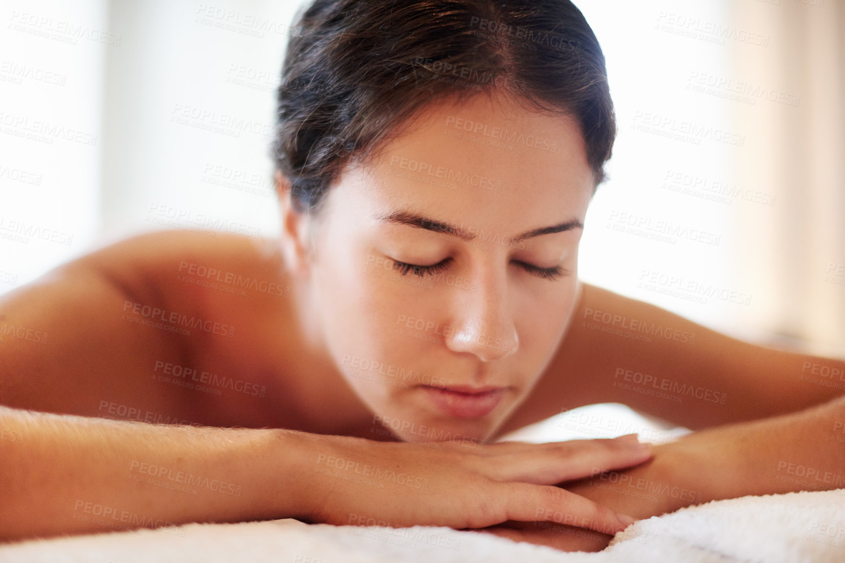 Buy stock photo Woman, relax and sleeping with spa day for beauty, physical therapy or body treatment at resort. Face, female person and asleep with relaxation on massage bed for salon getaway, stress relief or zen