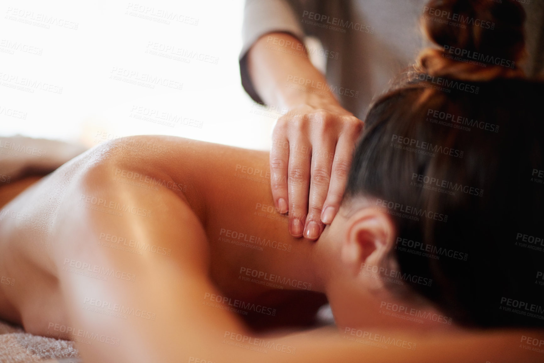 Buy stock photo Woman, hands or relax with neck massage at spa for physical therapy or body treatment at resort. Closeup, masseuse or female person lying on bed at luxury salon for shoulder rub, zen or stress relief
