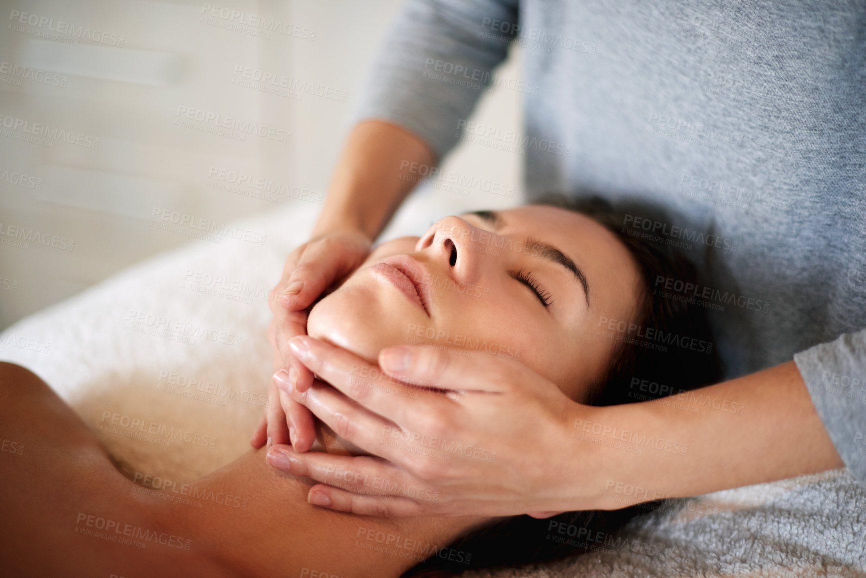 Buy stock photo Massage, woman and masseuse hands for therapy at spa, beauty treatment and holistic healing with skincare. Person, luxury resort and client pressure at salon, cosmetic service and smooth or soft skin