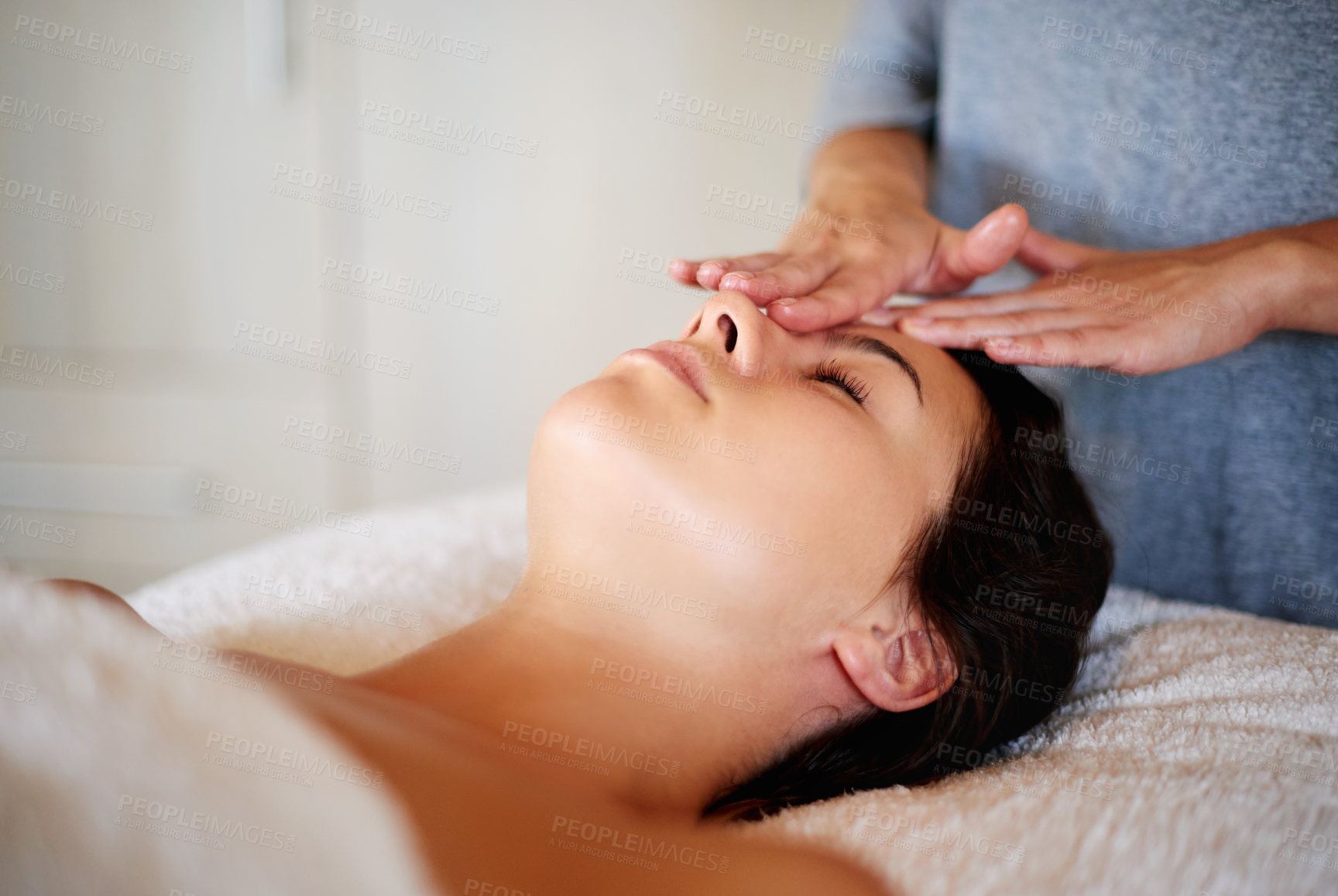Buy stock photo Massage, woman face and masseuse with hands at spa, beauty treatment and holistic healing with skincare. Therapy, luxury resort and client pressure at salon, cosmetic service and smooth or soft skin